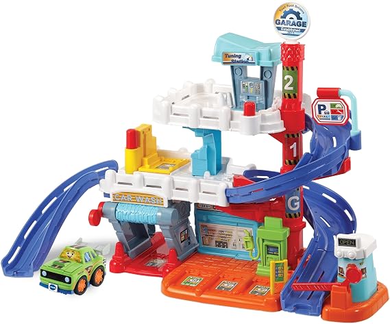 VTech Toot-Toot Drivers Fix & Fuel Garage, English | Three-level garage with stock car, tuning station, shop, car wash and fuel station for vehicle role-play. Ages 1-5